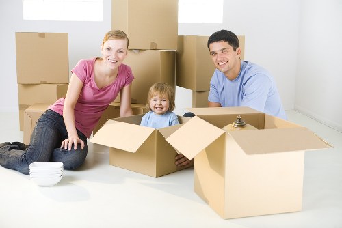 Professional Bromley removals team handling household moving boxes with care