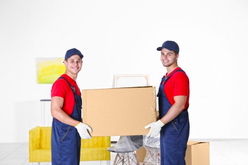 Packed office equipment ready for a commercial move in Bromley