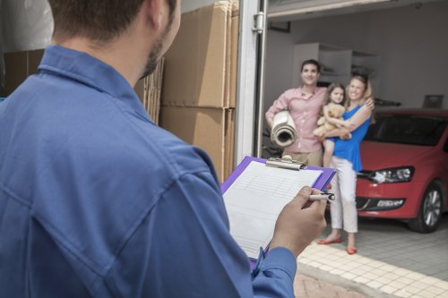 Boxes and furniture representing a small flat removals job