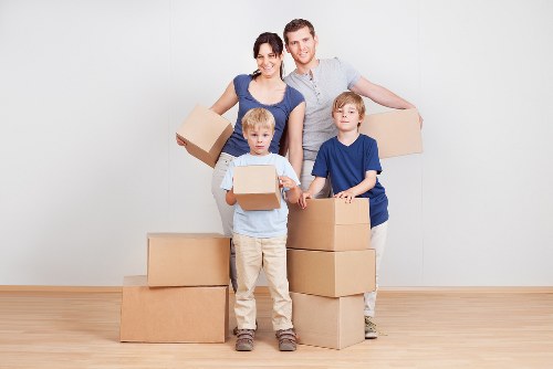 Professional movers handling office equipment during a Bromley relocation