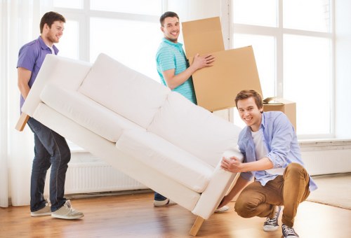 Removal crew reviewing access details before a local move