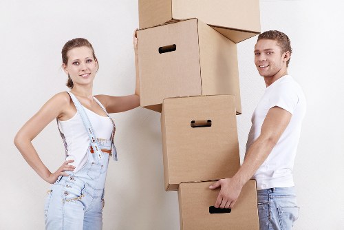 Professional Bromley removals team loading boxes and household items into a van