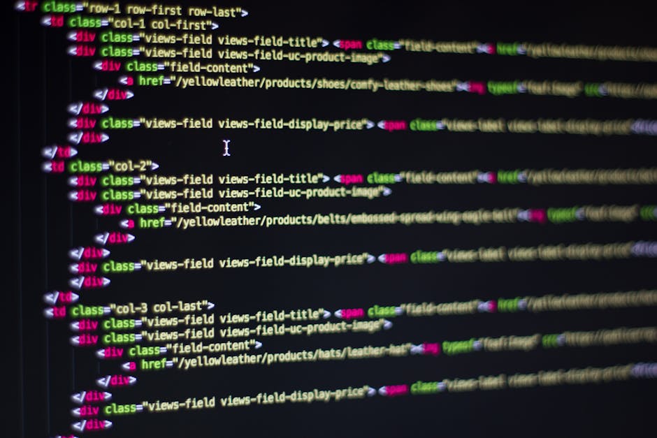 Close-up image of a computer screen displaying a code editor with multiple lines of HTML markup, including nested div elements with class attributes such as 'views-field' and 'field-content,' highligh